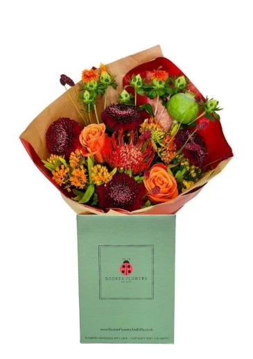 Autumn Harvest Delight hand tied bouquet in water